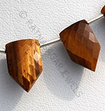 Tiger eye gemstone pentagon shape beads.